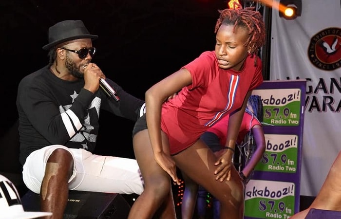 VIDEO: Bebe Cool chews female fan on stage
