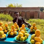 PHOTOS: John Blaq hawks mangoes alongside the road