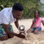 VIDEO: Best dad ever! Bobi Wine plays in sand like a baby