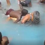 Video: Young boy tries to chew old mummy at beach as other adults cheer on