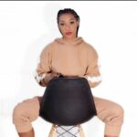 PHOTOS: Upcoming singer Tiana Bax poses topless