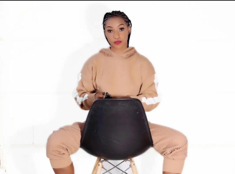 PHOTOS: Upcoming singer Tiana Bax poses topless