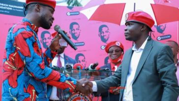 VIDEO: Bobi Wine finally shakes hands with Ronald Mayinja amidst betrayal