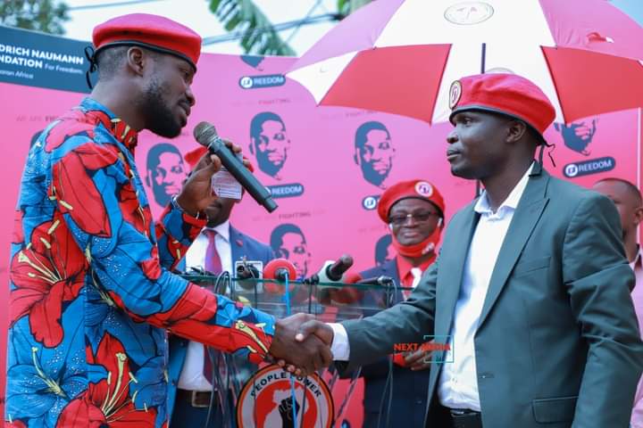 VIDEO: Bobi Wine finally shakes hands with Ronald Mayinja amidst betrayal