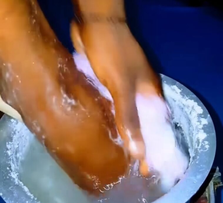 VIDEO: Shock as woman washes her feet in saucepan after cooking for hubby