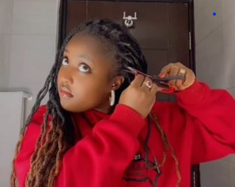 VIDEO: Watch as Martha Kay painfully cuts off her hair of 14 years