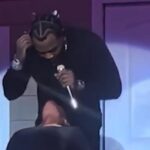 VIDEO: Watch American singer spit in fans mouth live on stage