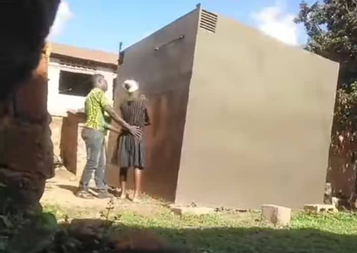 VIDEO: Couple nabbed chewing themselves behind house